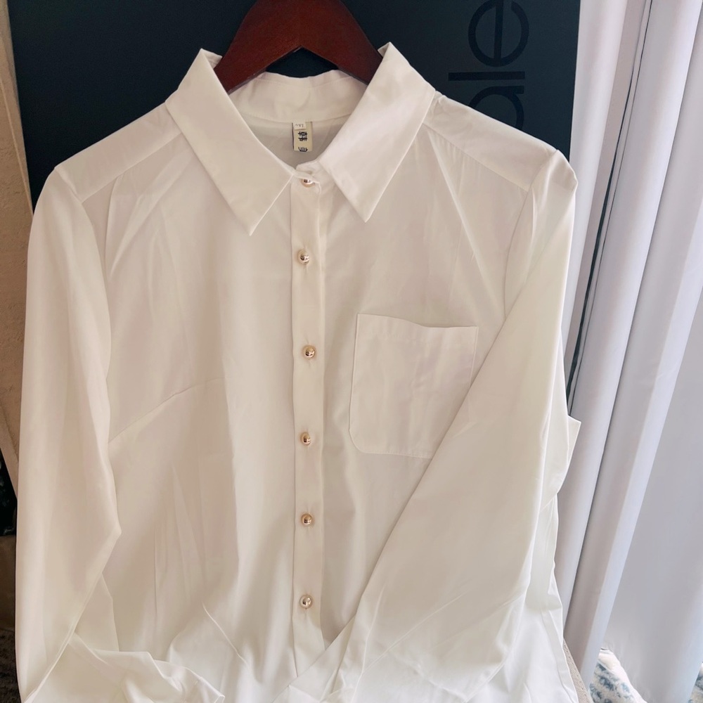 White blouse. Professional and classic blouse for formal to dressy occaisons.